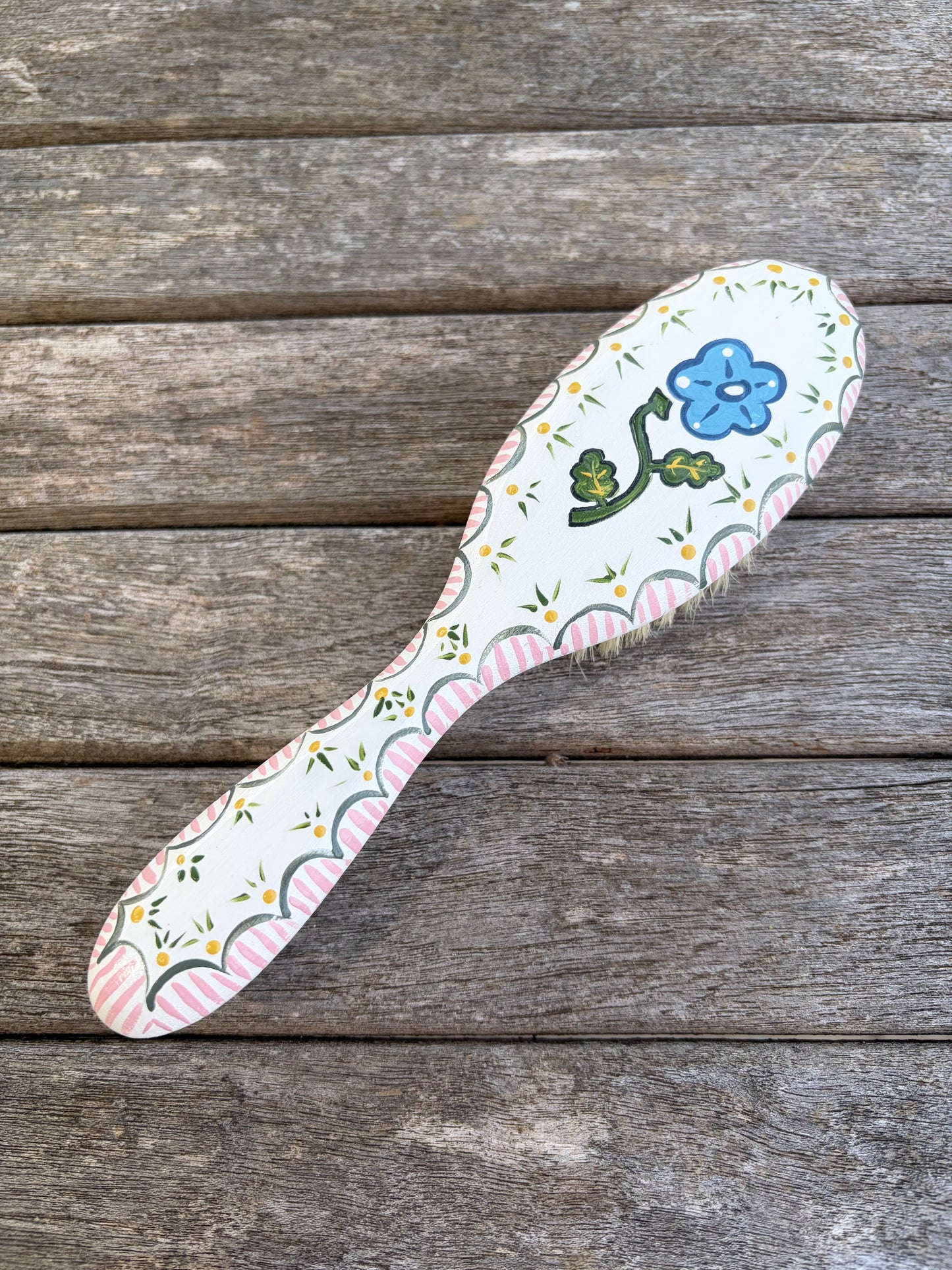Blue flower hairbrush